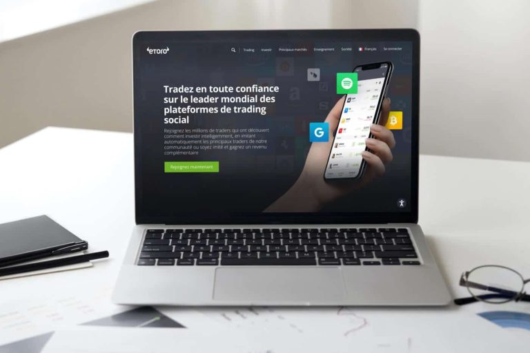 Plateforme de trading eToro avec interface utilisateur et graphiques financiers